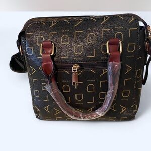 Structured Black and Gold Hobo Bag with Geometric Design